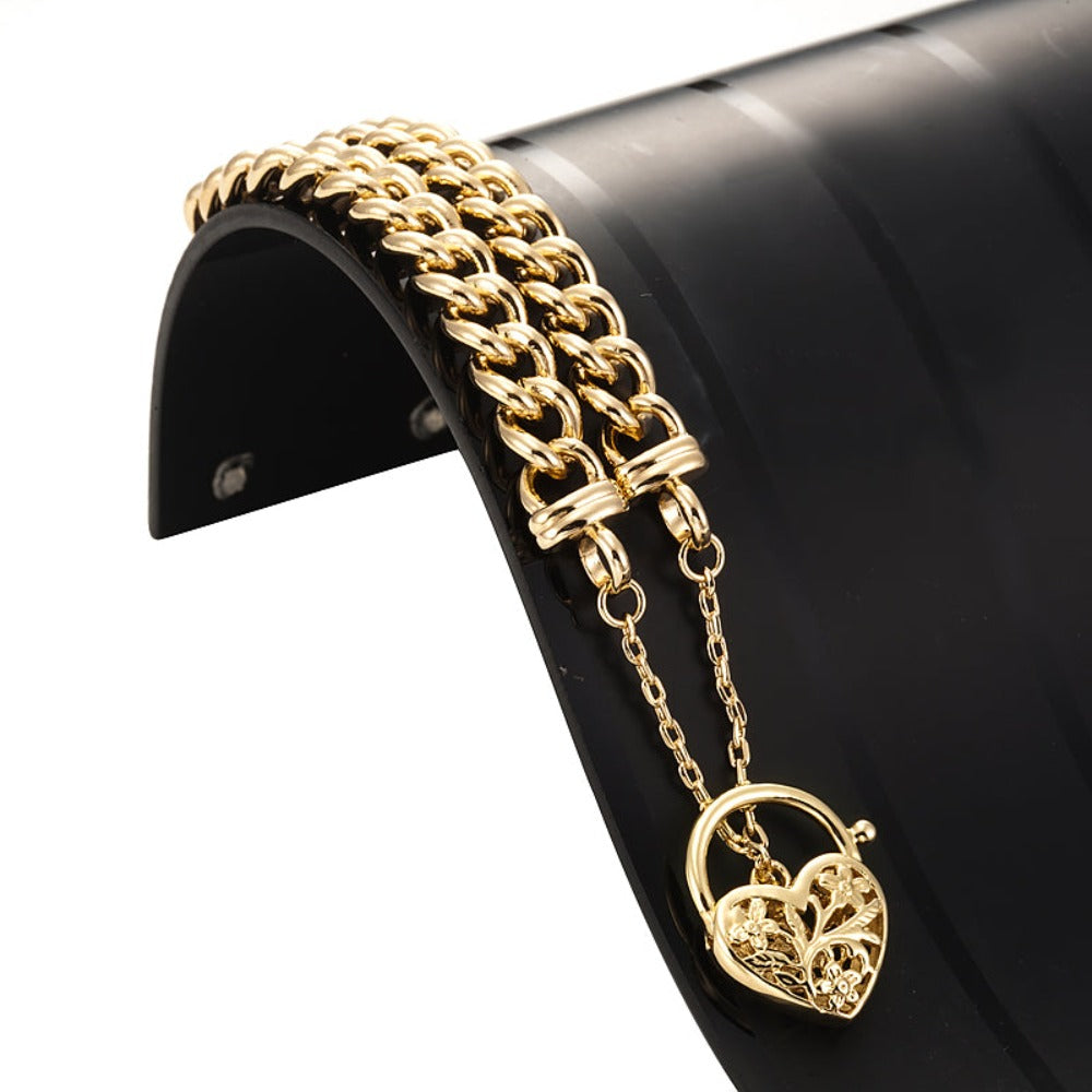 18ct Heavy Yellow Gold Plated Euro Chain Bracelet featuring a delicate filigree locket, showcasing its elegant design and craftsmanship.
