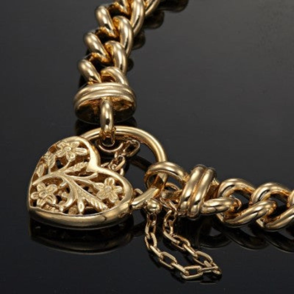 18ct Heavy Yellow Gold Plated Euro Chain Bracelet featuring a delicate filigree locket, showcasing its elegant design and craftsmanship.