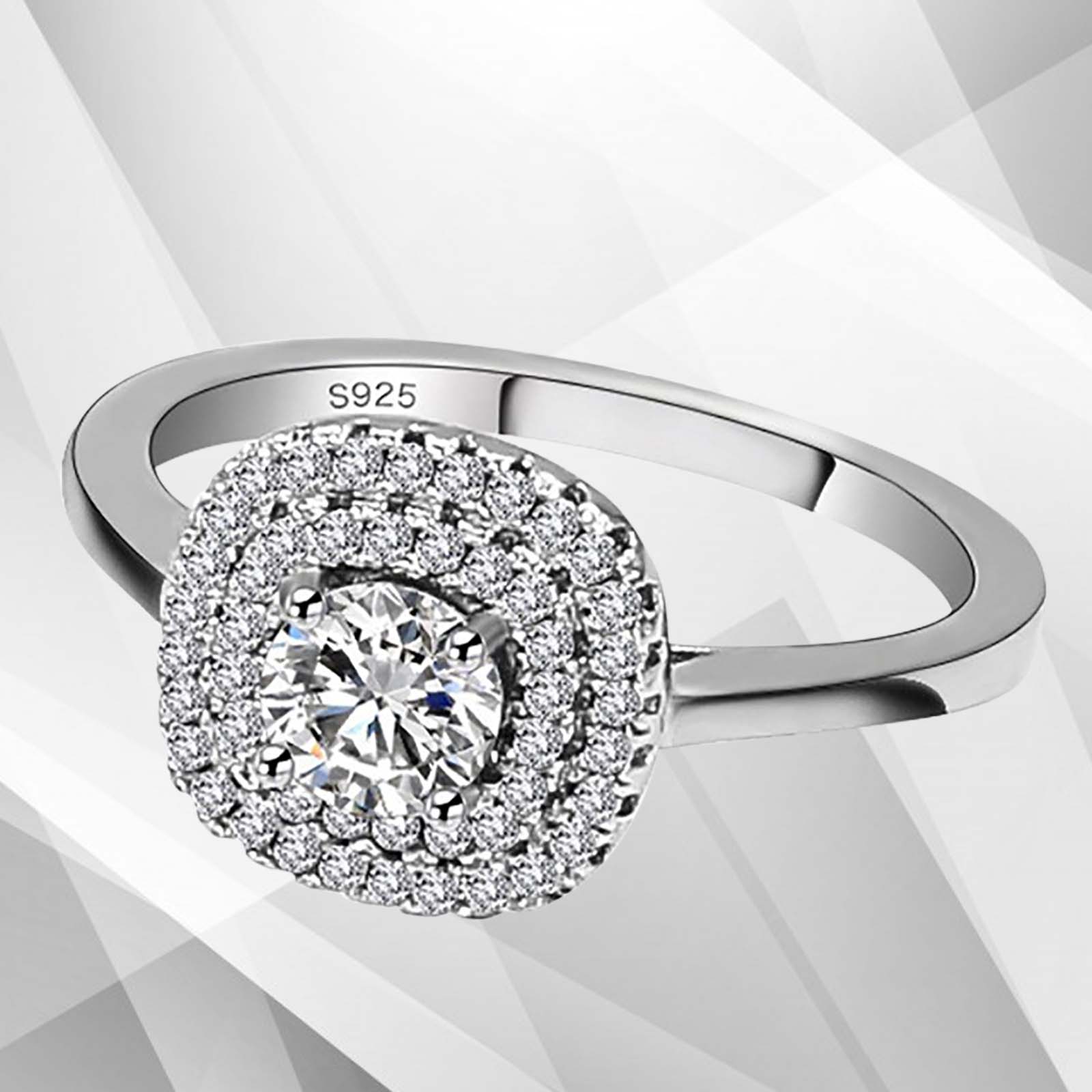 1.8Ct Round-Cut Diamond Cushion Halo Bridal Engagement Ring in 18K white gold, featuring a central diamond surrounded by a halo of smaller stones.