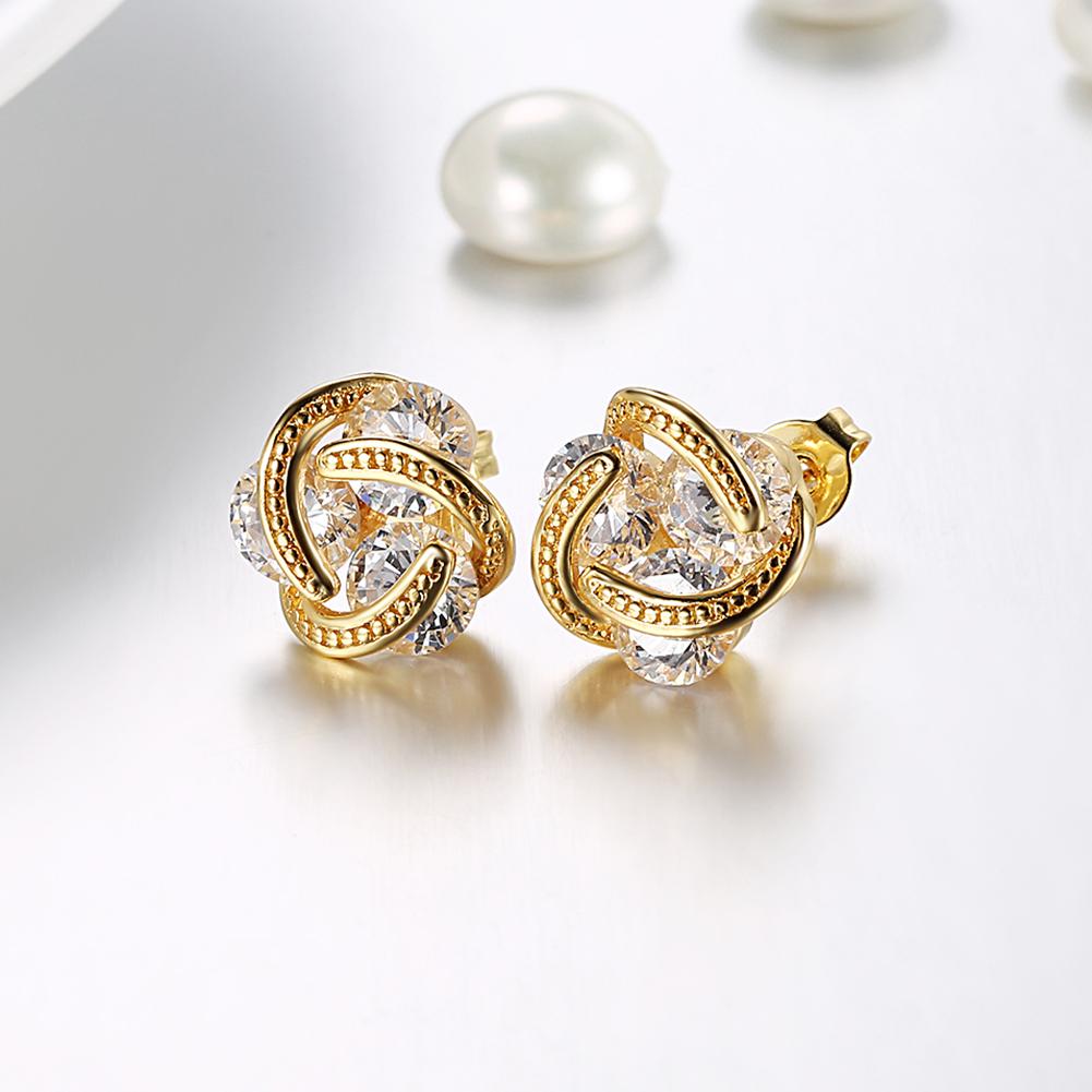 Elegant 18K Gold Plated Mesh Knot Stud Earrings featuring white Austrian elements, available in gold, rose gold, and white gold.