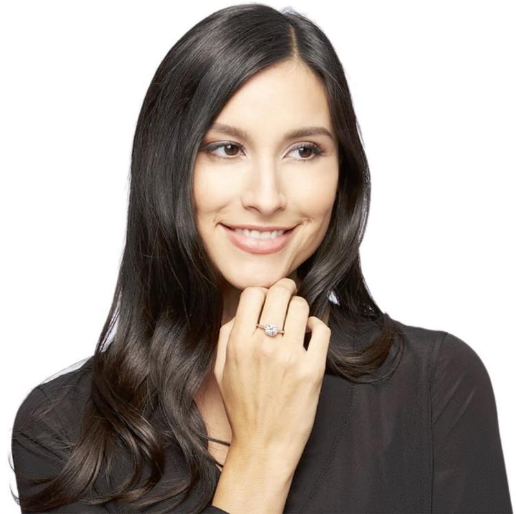 Elegant 18K White Gold Plated Crystal Halo Ring showcasing a sparkling crystal centerpiece surrounded by a halo of smaller crystals, available in three colors.