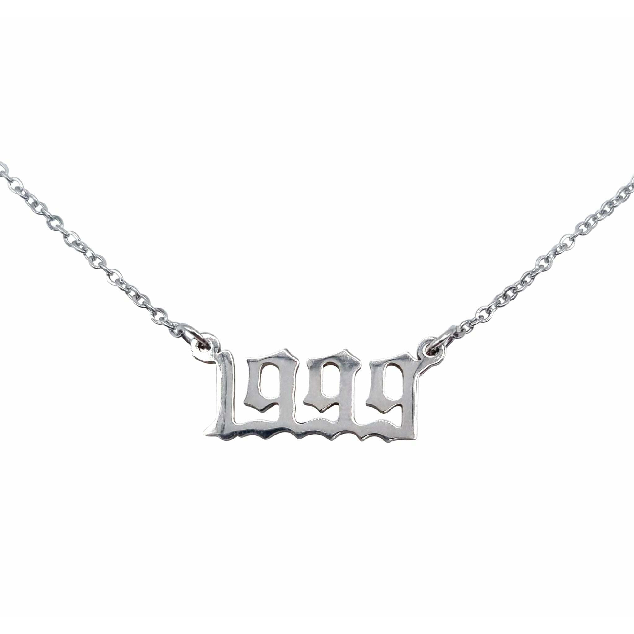 A stylish 1999 Year Necklace made of tarnish-free stainless steel, available in gold and silver finishes, showcasing a bold 2cm pendant on an 18-inch chain.