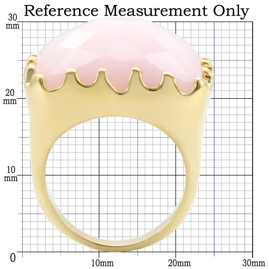 Gold brass ring featuring a rose-colored synthetic jade stone, elegantly designed for stylish wear.