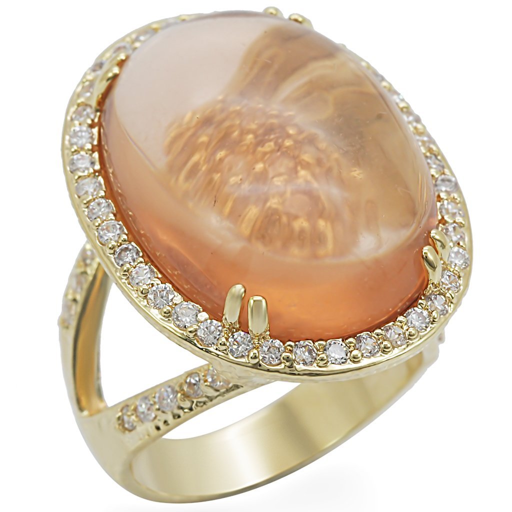 1W056 Gold Brass Ring featuring a champagne synthetic glass centerpiece, elegantly designed for any occasion.