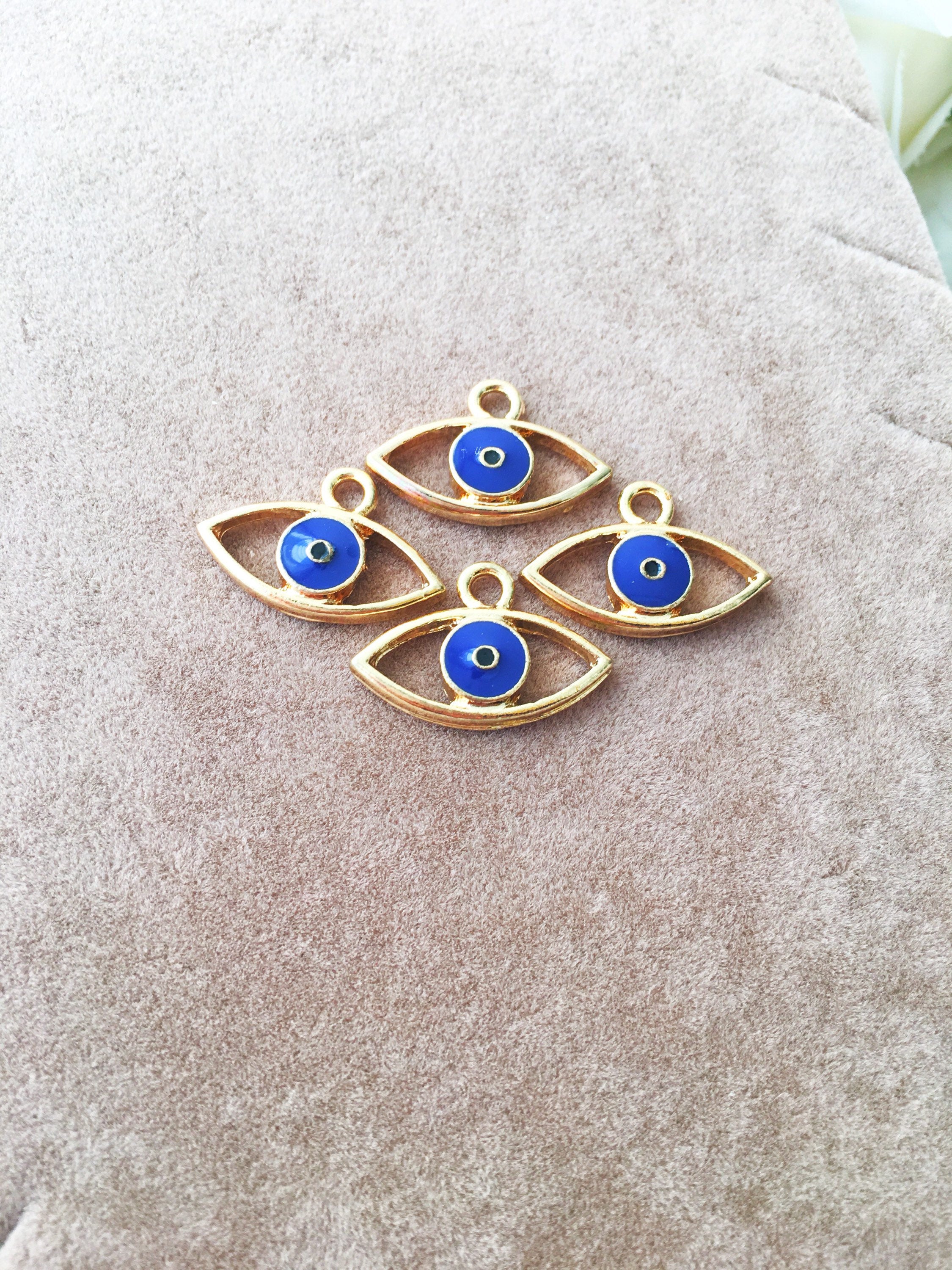 Two blue evil eye charms made of brass, featuring a 20mm size and 2mm hole, symbolizing protection and good fortune.