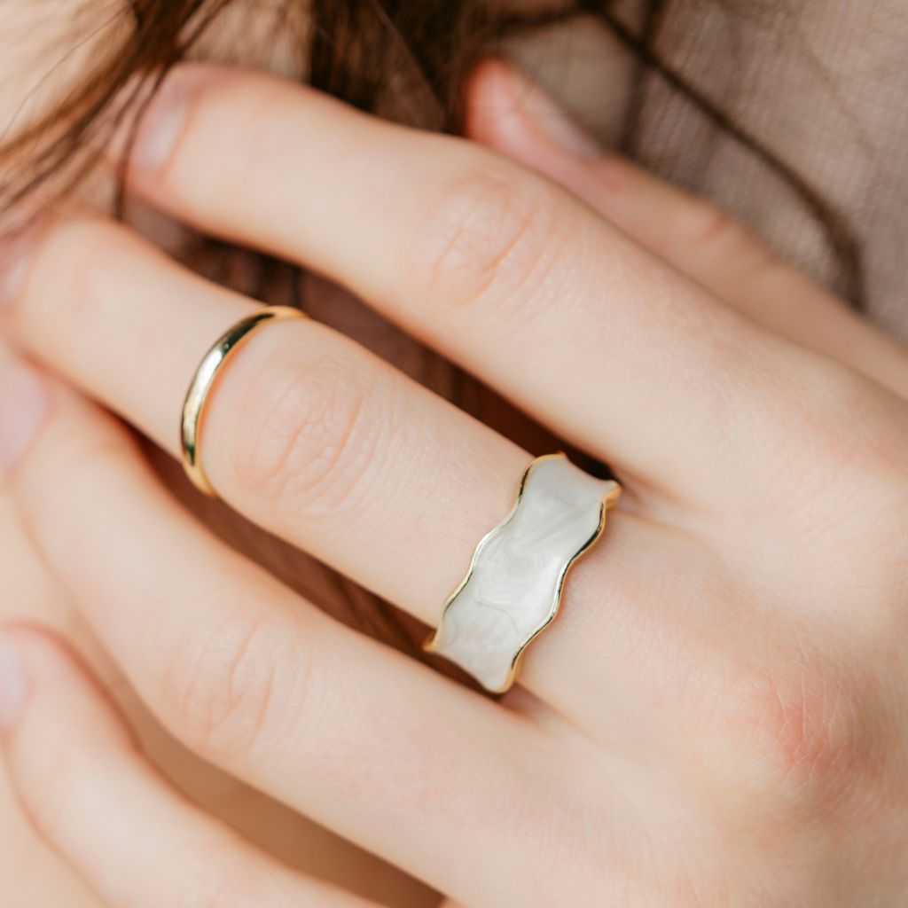 Two-piece adjustable gold band cuff ring set featuring boho and hippie designs, showcasing intricate detailing and a sleek finish.