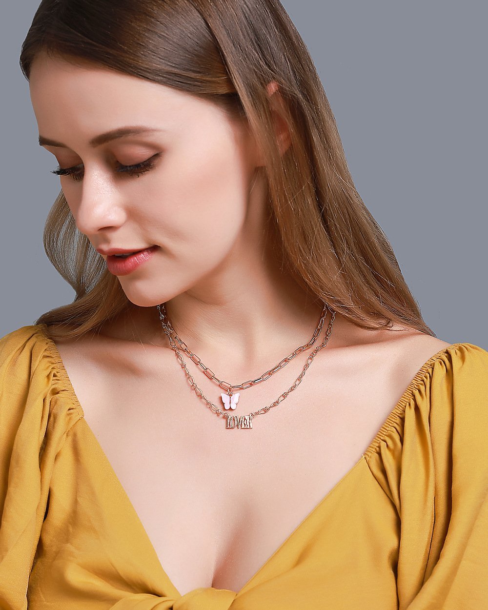 Elegant 2 Piece Butterfly Lover Necklace in 18K gold plating, featuring a delicate butterfly design and adjustable link chain.