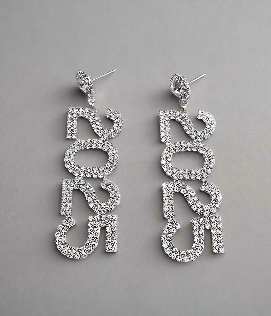 Elegant 2025 Dangle Earrings adorned with sparkling rhinestones, showcasing a stylish drop design.