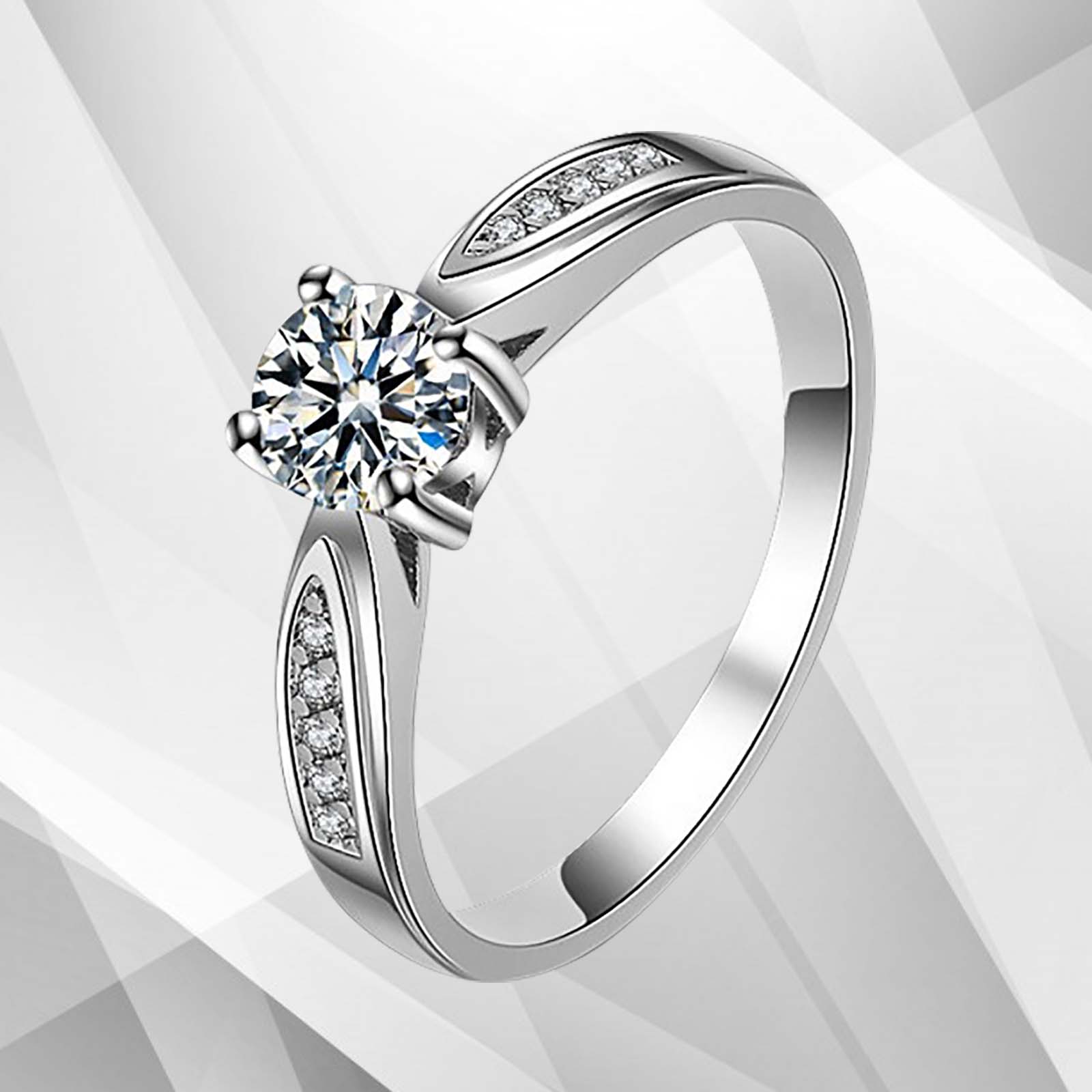 2.0Ct Round-Cut 11 Diamonds Solitaire Bridal Engagement Ring in 18K White Gold, showcasing a central diamond surrounded by smaller diamonds in a beautiful setting.