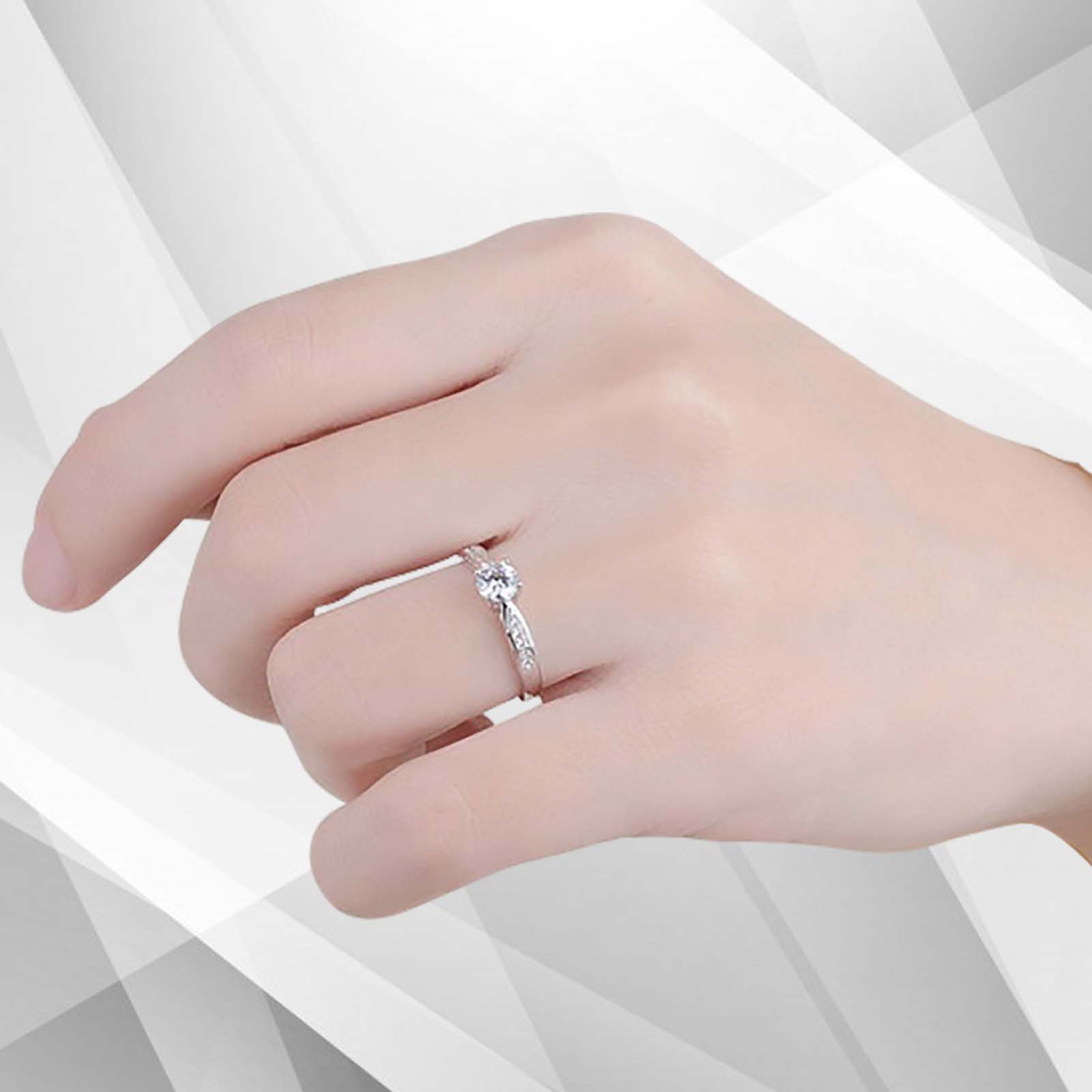 2.0Ct Round-Cut 11 Diamonds Solitaire Bridal Engagement Ring in 18K White Gold, showcasing a central diamond surrounded by smaller diamonds in a beautiful setting.