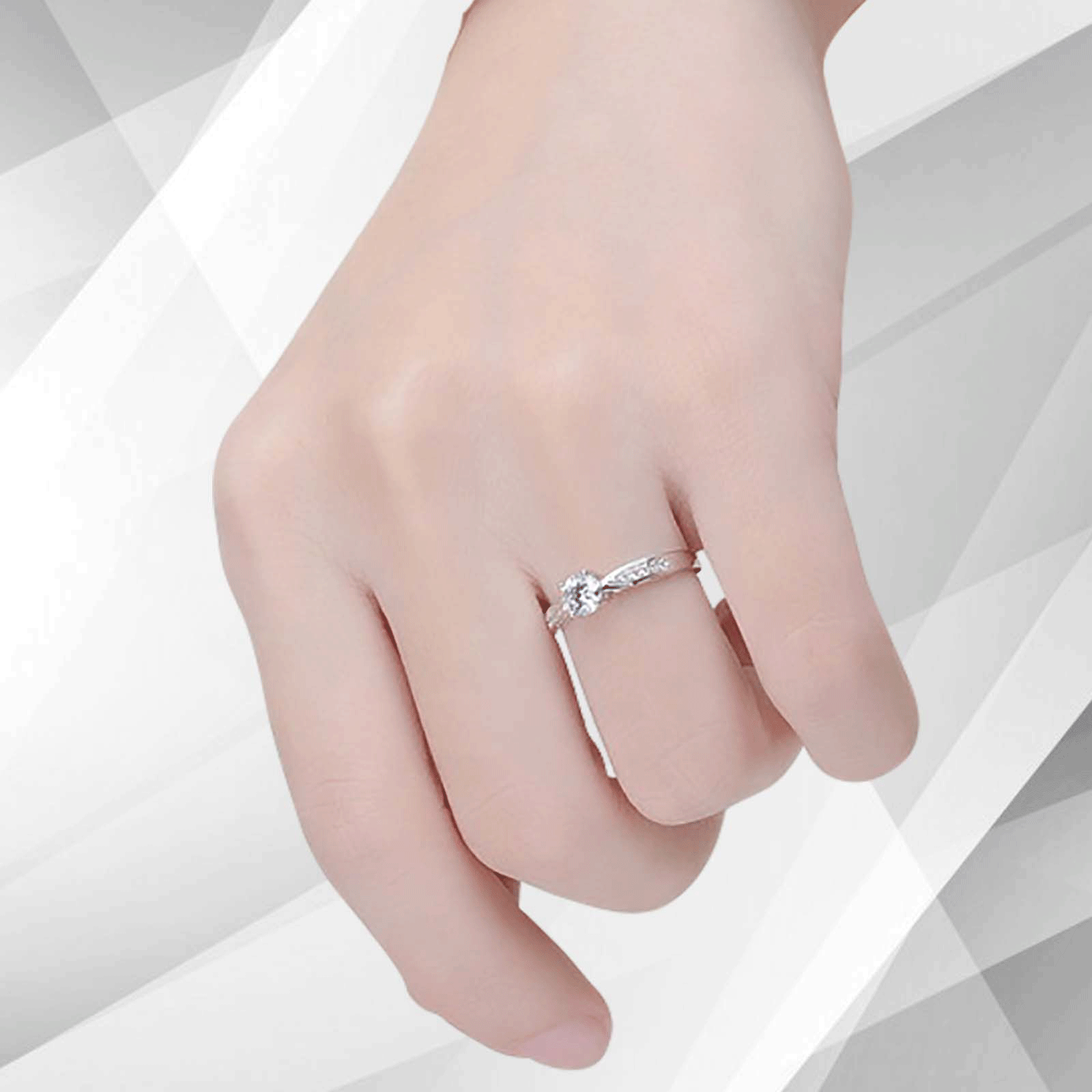 2.0Ct Round-Cut 11 Diamonds Solitaire Bridal Engagement Ring in 18K White Gold, showcasing a central diamond surrounded by smaller diamonds in a beautiful setting.