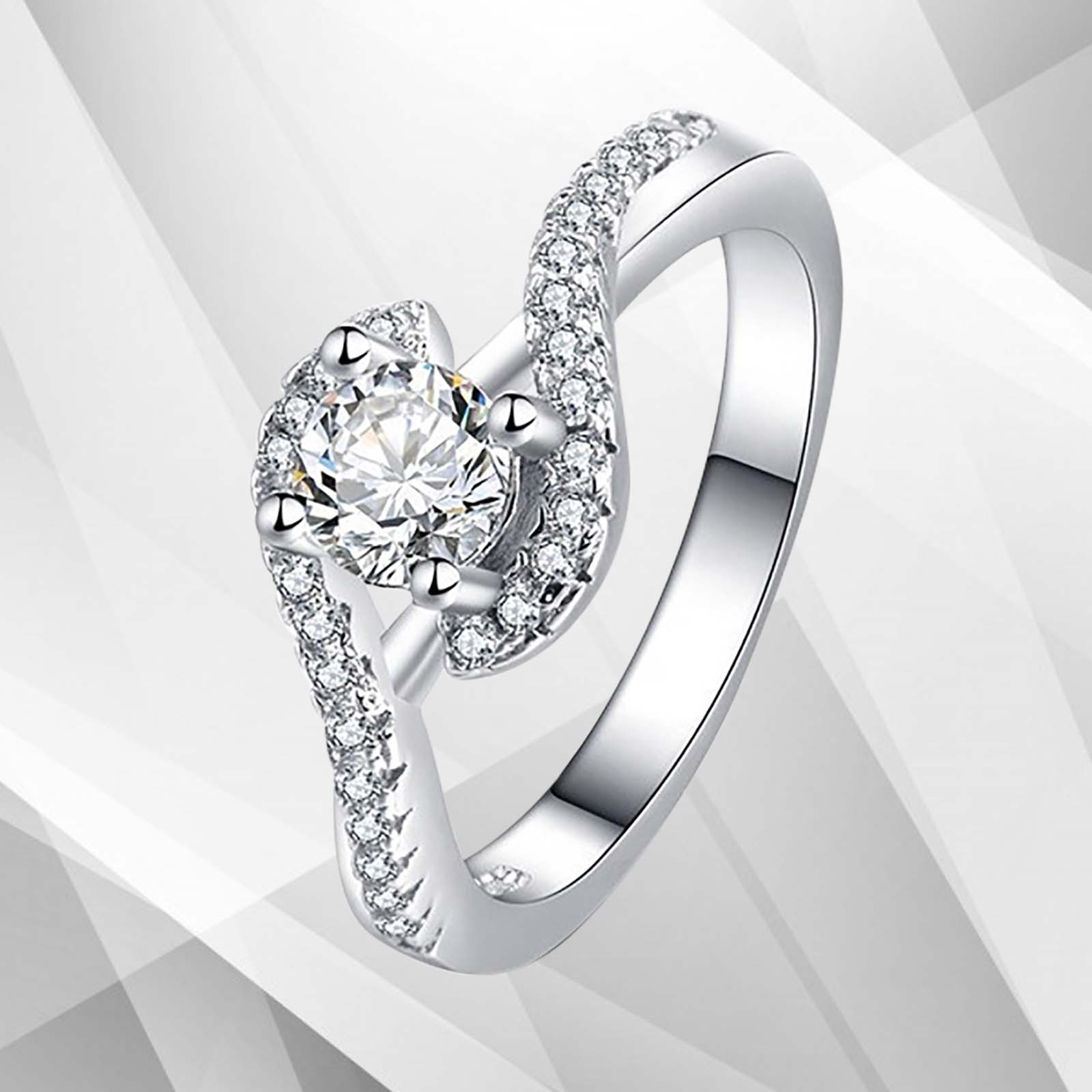 2.0Ct Round-Cut Halo Engagement Ring featuring 31 CZ diamonds set in 18Ct white gold, elegantly displayed in a presentation box.