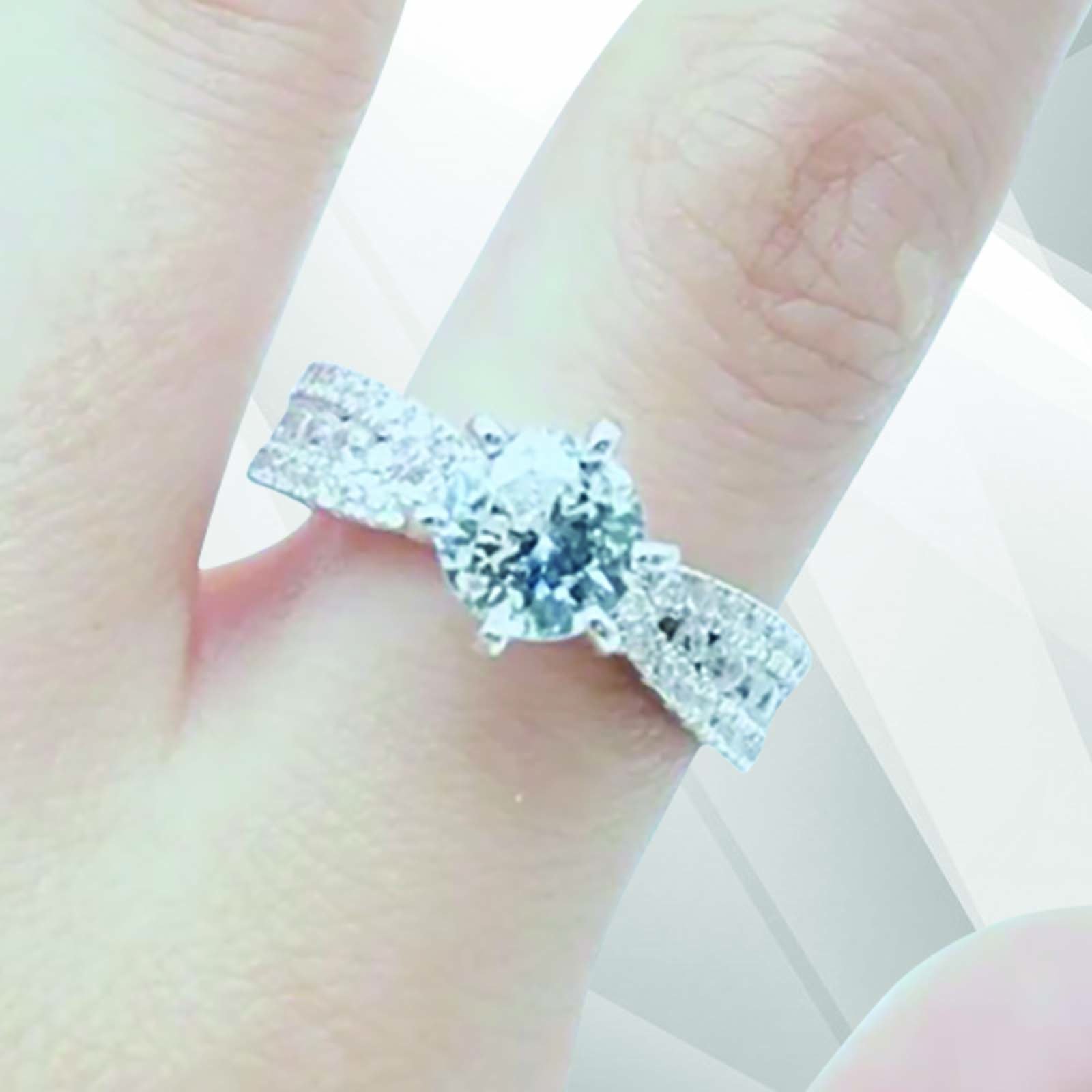 2.0Ct Round-Cut CZ Diamond Solitaire Bridal Engagement Ring set in 18K white gold, showcasing its brilliant shine and elegant design.