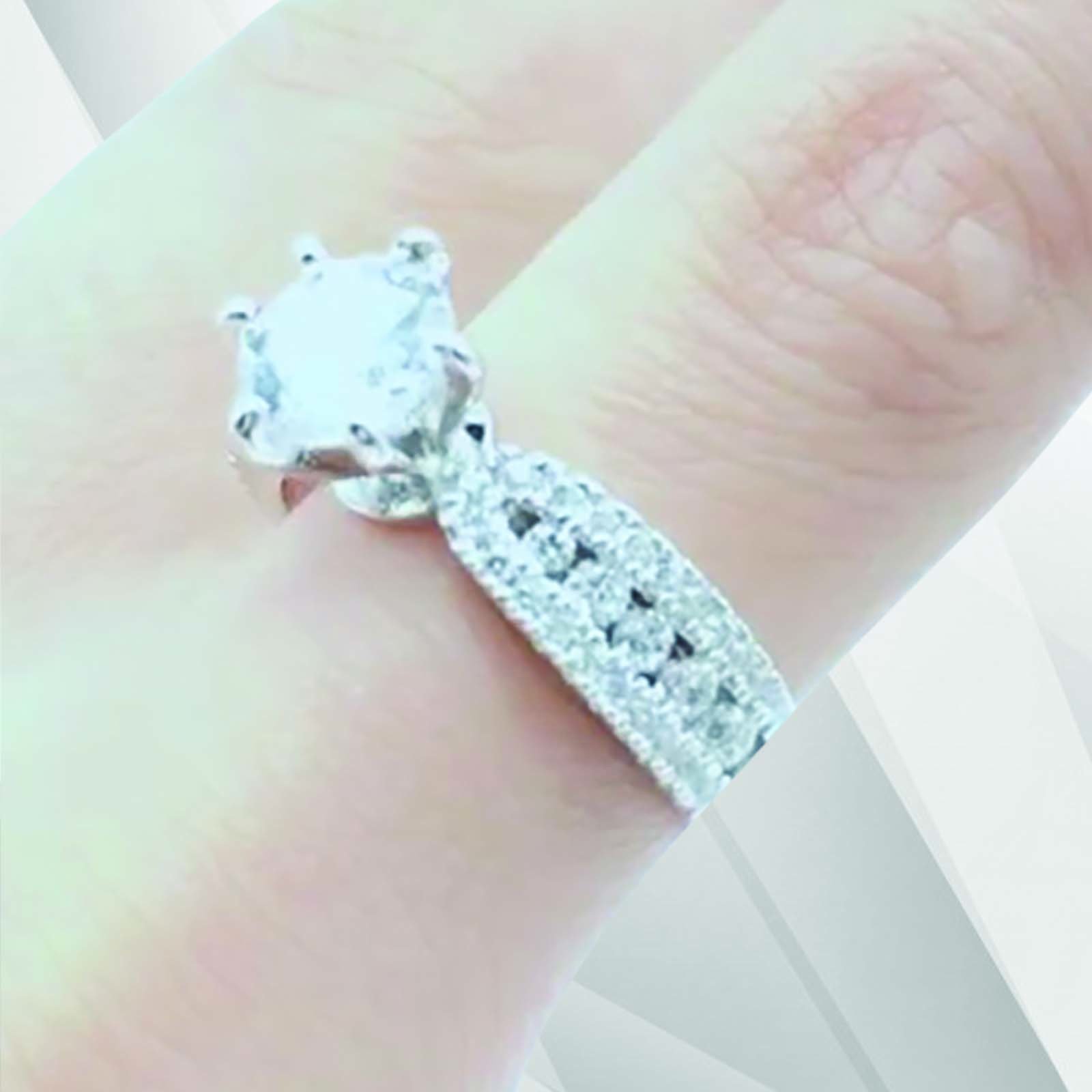 2.0Ct Round-Cut CZ Diamond Solitaire Bridal Engagement Ring set in 18K white gold, showcasing its brilliant shine and elegant design.