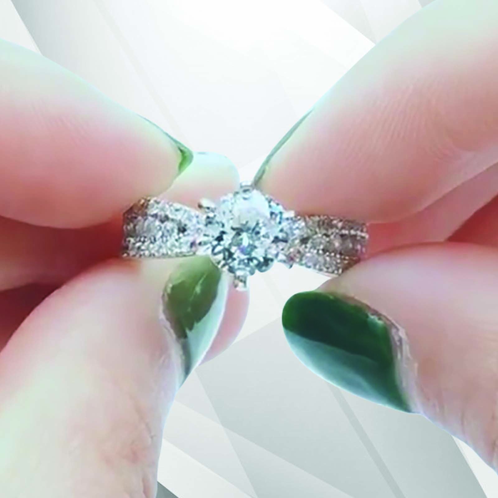 2.0Ct Round-Cut CZ Diamond Solitaire Bridal Engagement Ring set in 18K white gold, showcasing its brilliant shine and elegant design.