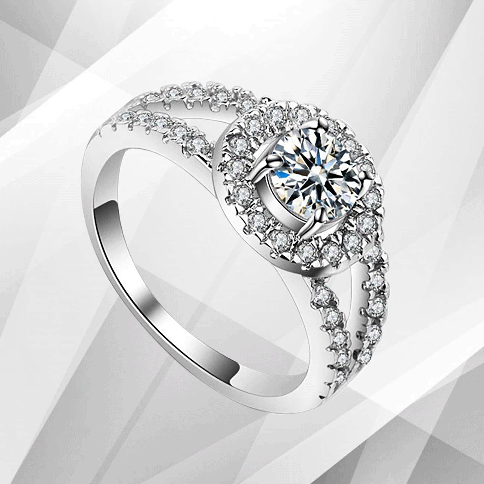 2.0Ct Round-Cut Diamond Halo Bridal Engagement Ring set in 18Ct White Gold, featuring a central round diamond surrounded by a halo of smaller stones.