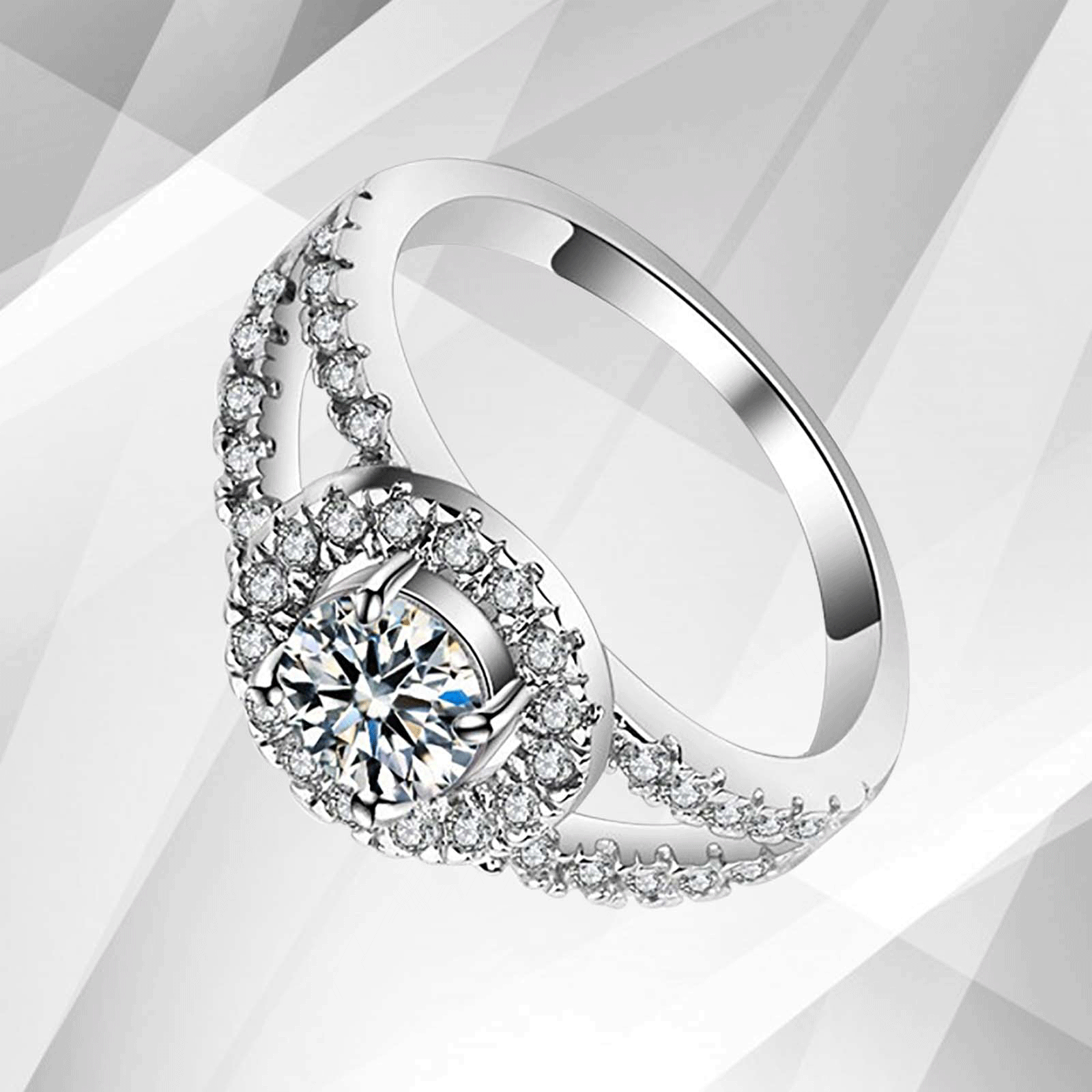 2.0Ct Round-Cut Diamond Halo Bridal Engagement Ring set in 18Ct White Gold, featuring a central round diamond surrounded by a halo of smaller stones.