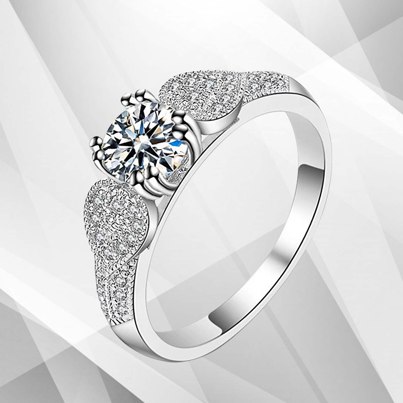 2.0Ct Round-Cut Diamond Solitaire Bridal Engagement Ring in 18Ct white gold, showcasing a brilliant diamond set in prong settings.