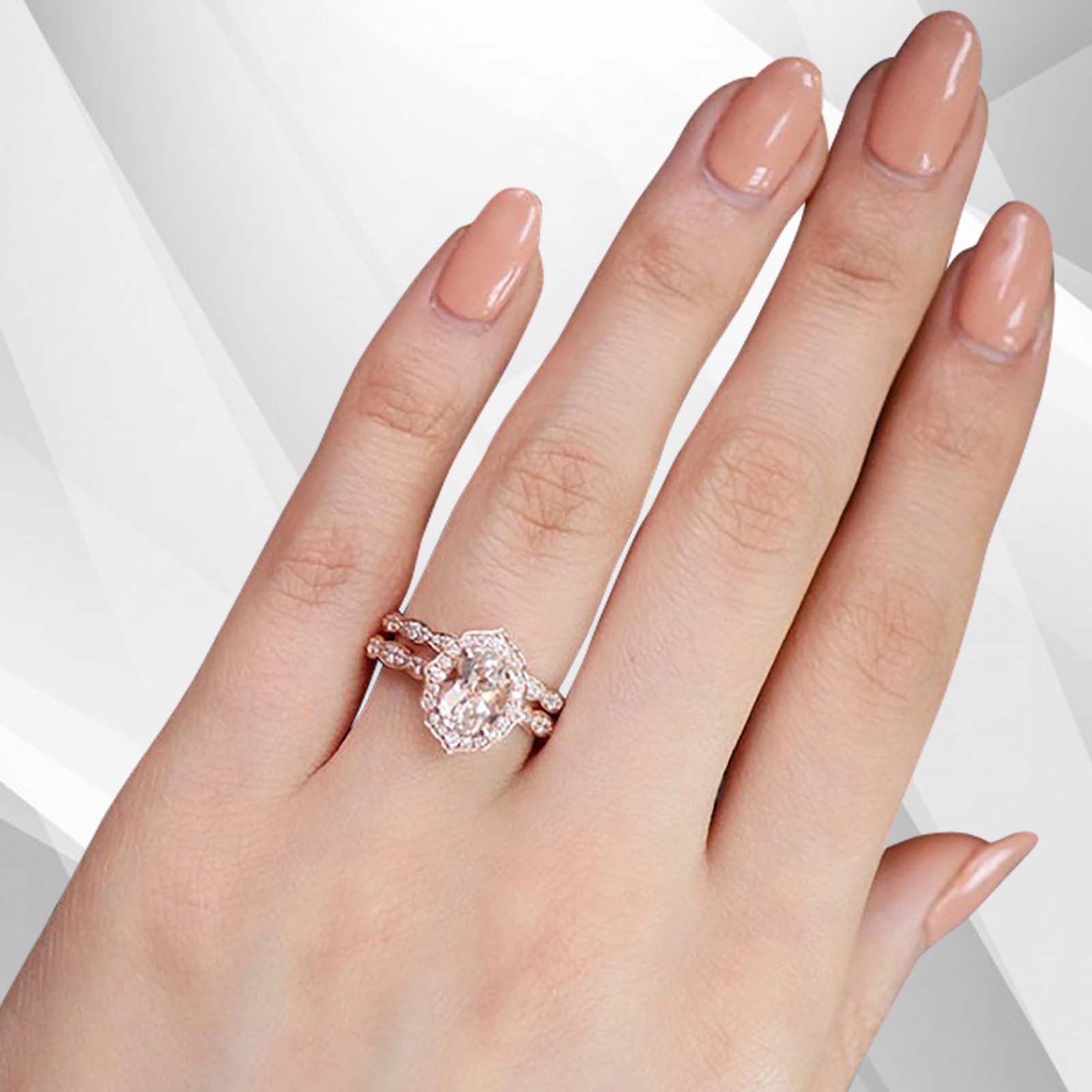 2.50Ct Morganite Diamond Halo Bridal Engagement Ring Set in 18Ct Rose Gold, featuring a stunning oval cut morganite stone surrounded by a halo of diamonds.