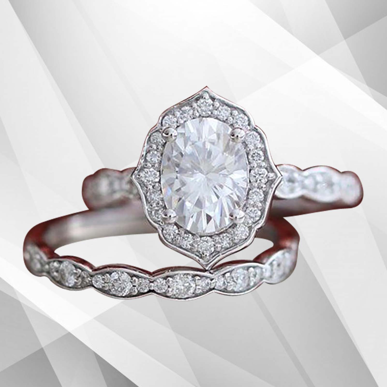 Elegant 2.50Ct oval-cut diamond halo engagement ring set in 18K white gold, showcasing intricate design and sparkling stones.