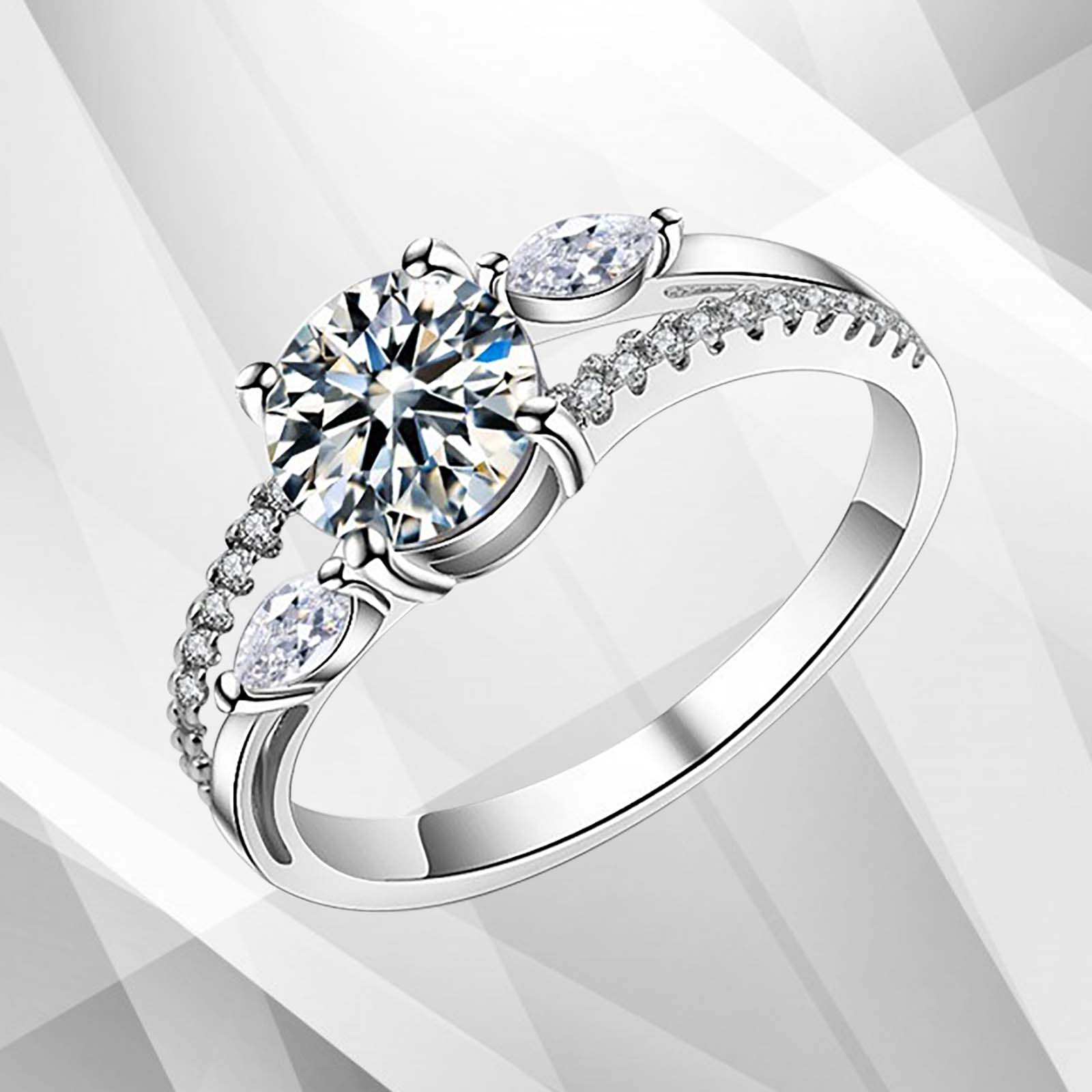 2.50Ct Round Cut Diamond Solitaire Bridal Engagement Ring in 18Ct White Gold, featuring a brilliant round diamond set in elegant prong and channel settings.