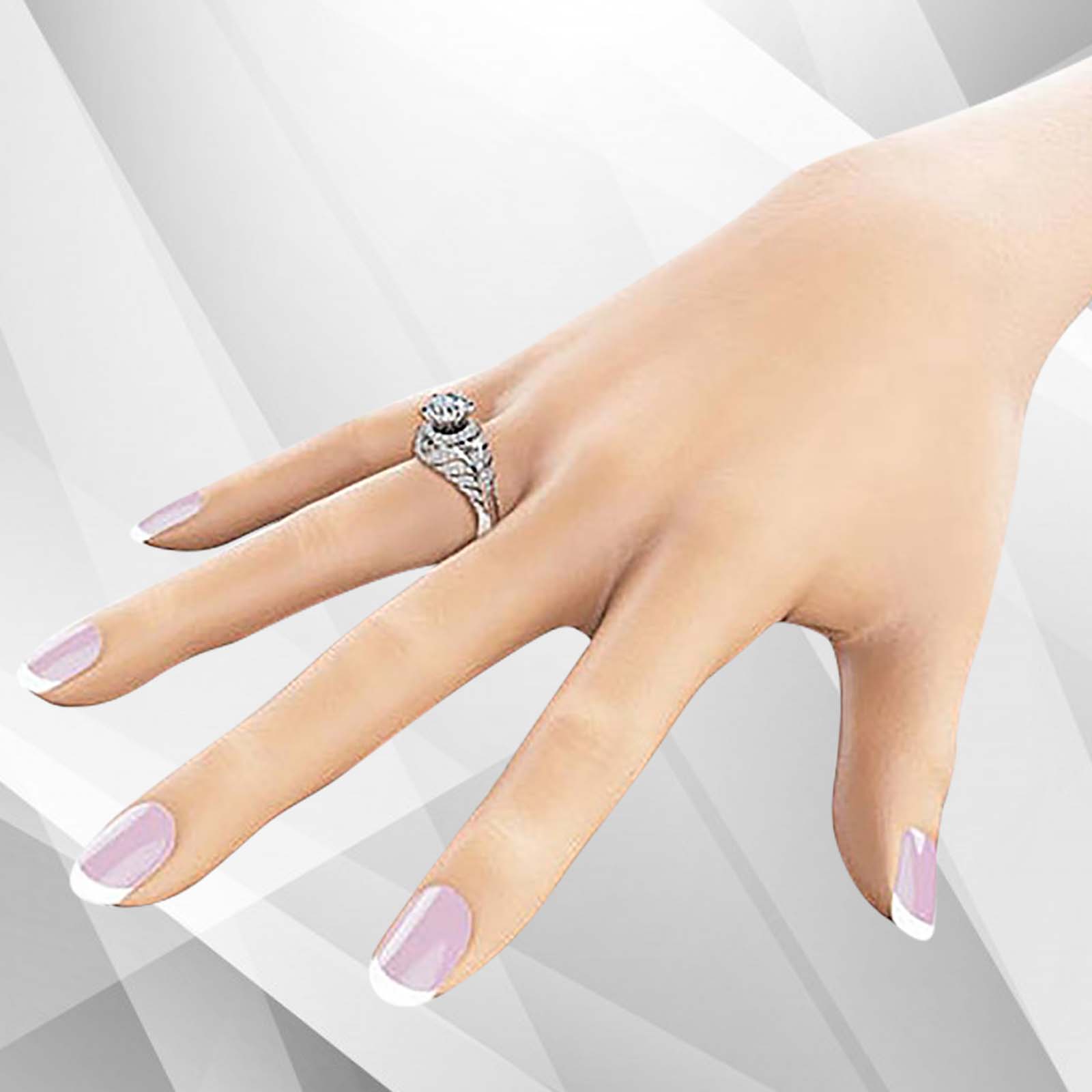 Elegant 2.50Ct Round-Cut 55 Diamonds Engagement Ring in 18k white gold, showcasing its brilliant sparkle and exquisite prong settings.