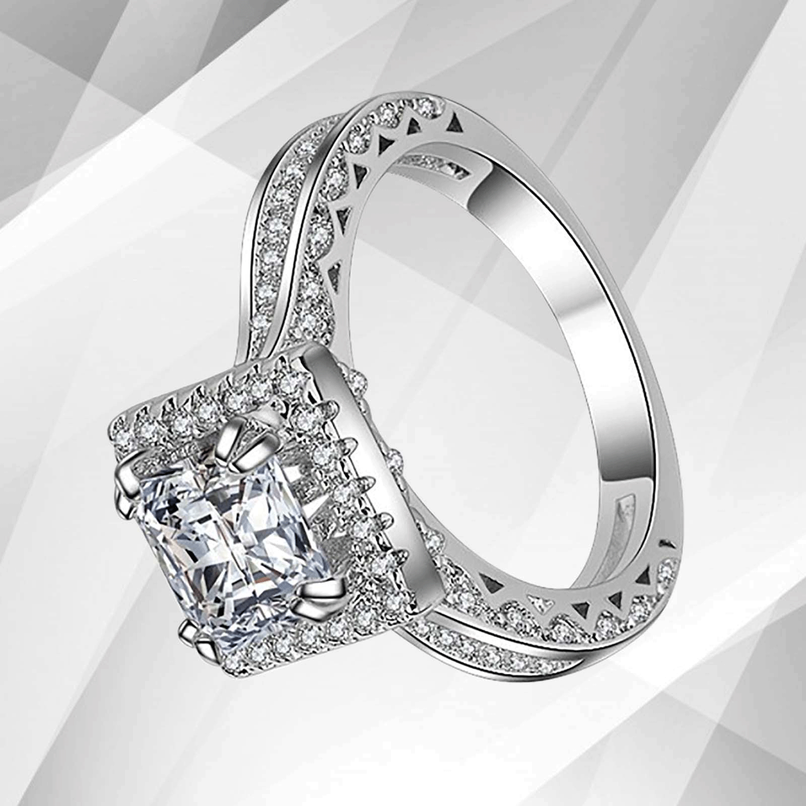 2.5Ct Princess-Cut Cushion Halo Engagement Ring in 18Ct White Gold with 94 sparkling diamonds, showcasing exquisite craftsmanship and elegance.