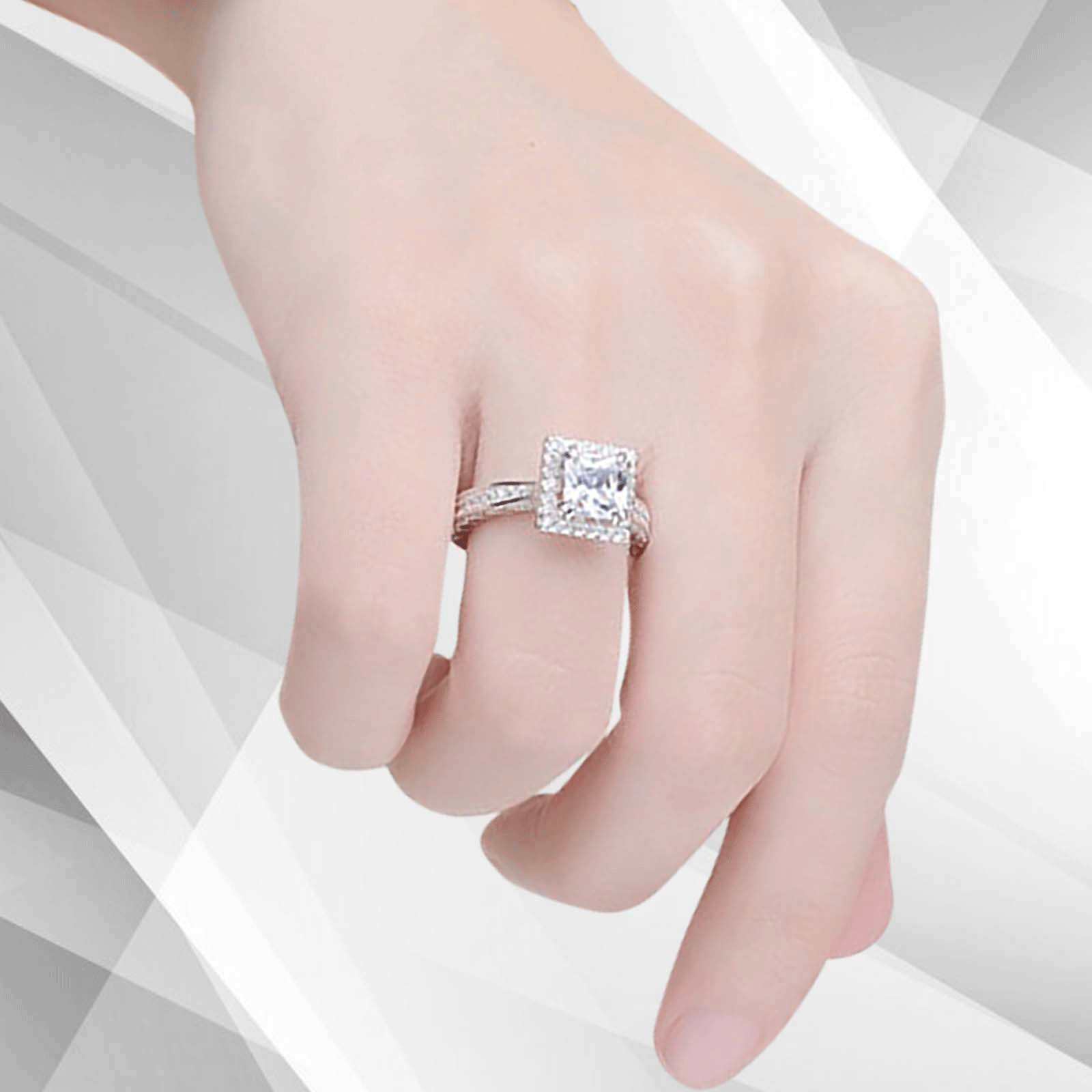 2.5Ct Princess-Cut Cushion Halo Engagement Ring in 18Ct White Gold with 94 sparkling diamonds, showcasing exquisite craftsmanship and elegance.