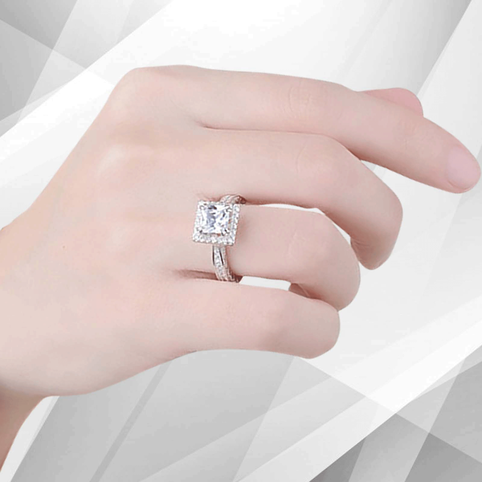 2.5Ct Princess-Cut Cushion Halo Engagement Ring in 18Ct White Gold with 94 sparkling diamonds, showcasing exquisite craftsmanship and elegance.