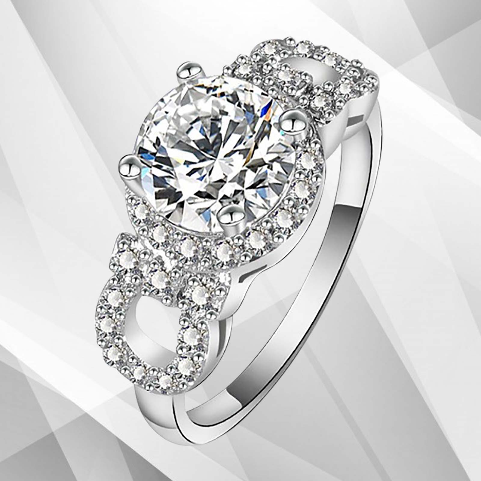 2.5Ct Round-Cut Diamonds Cushion Halo Bridal Engagement Ring in 18K White Gold, showcasing its elegant design and sparkling diamond.