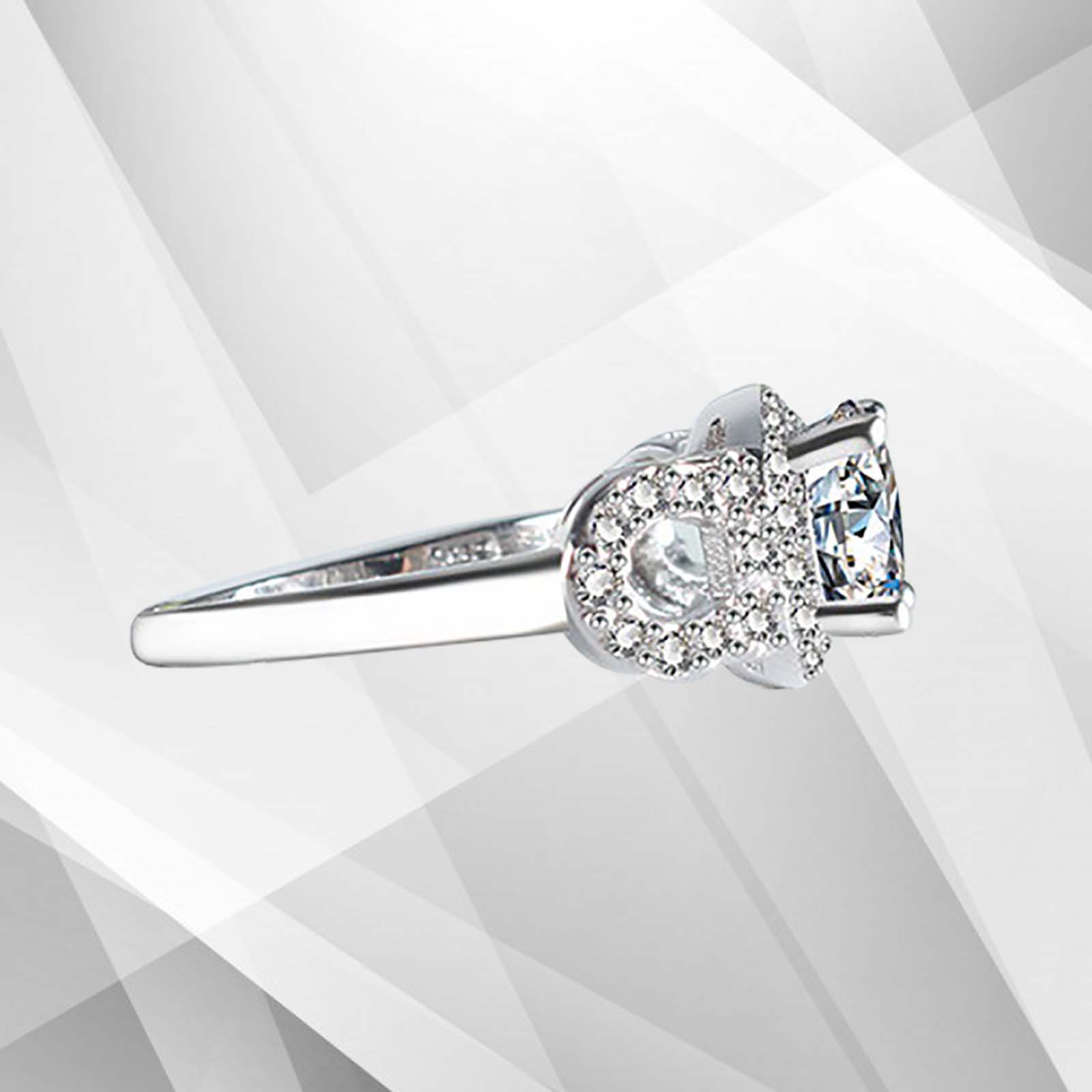 2.5Ct Round-Cut Diamonds Cushion Halo Bridal Engagement Ring in 18K White Gold, showcasing its elegant design and sparkling diamond.