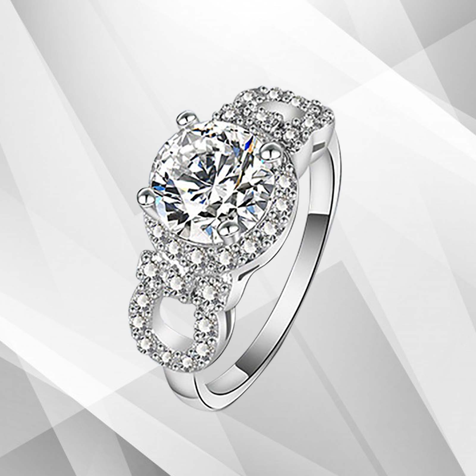 2.5Ct Round-Cut Diamonds Cushion Halo Bridal Engagement Ring in 18K White Gold, showcasing its elegant design and sparkling diamond.