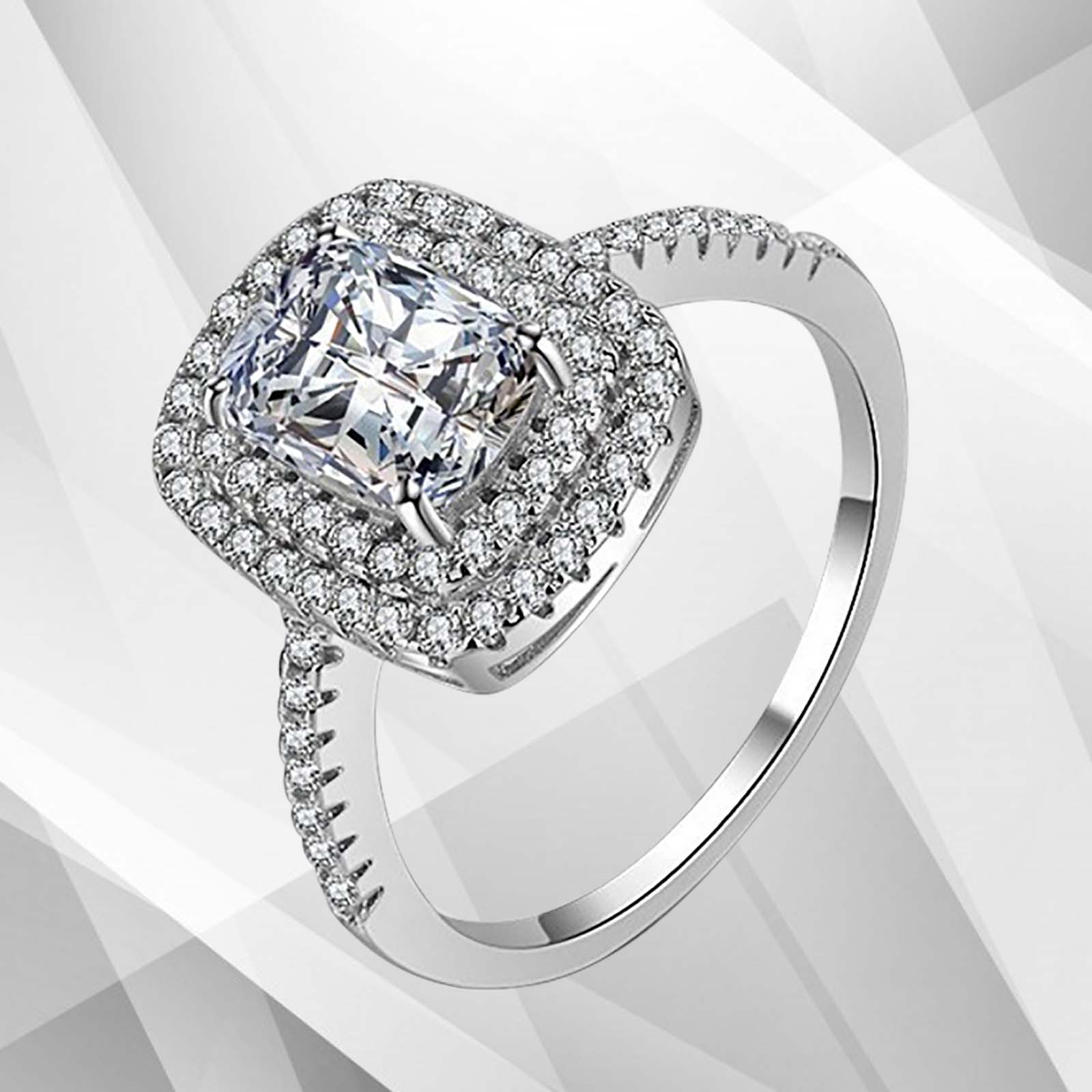 2.5Ct Square-Cut Diamond Cushion Halo Bridal Engagement Ring set in 18K white gold, featuring a sparkling center stone surrounded by a halo of smaller diamonds.