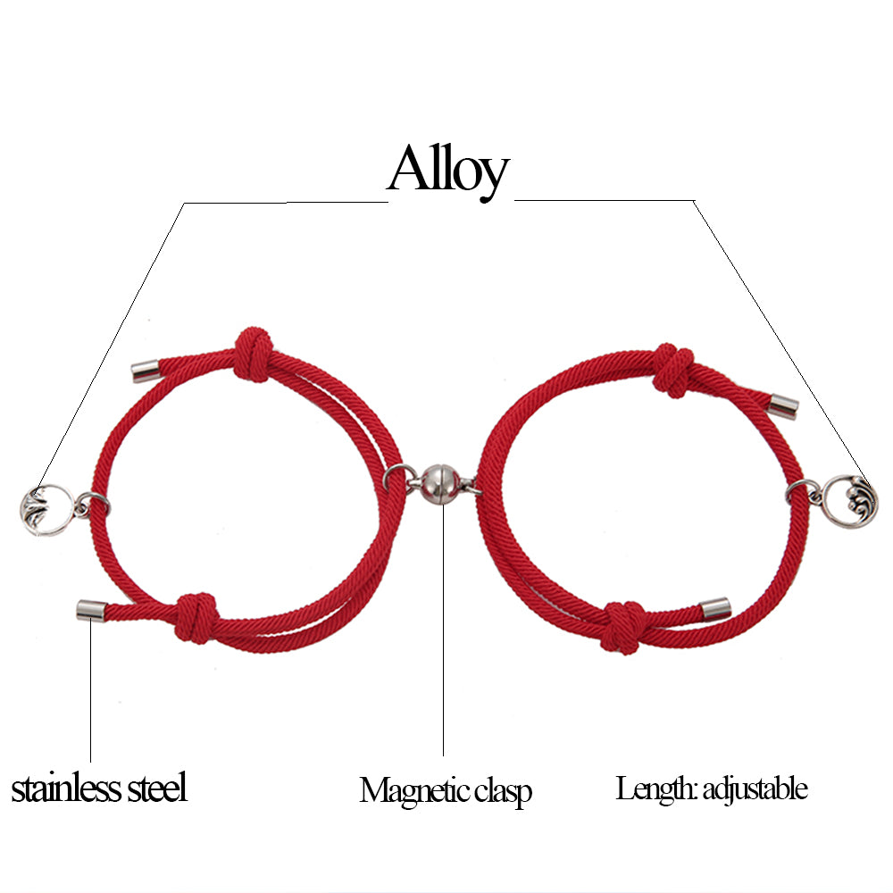 A pair of stylish alloy couple bracelets featuring magnetic attraction balls, symbolizing love and connection.