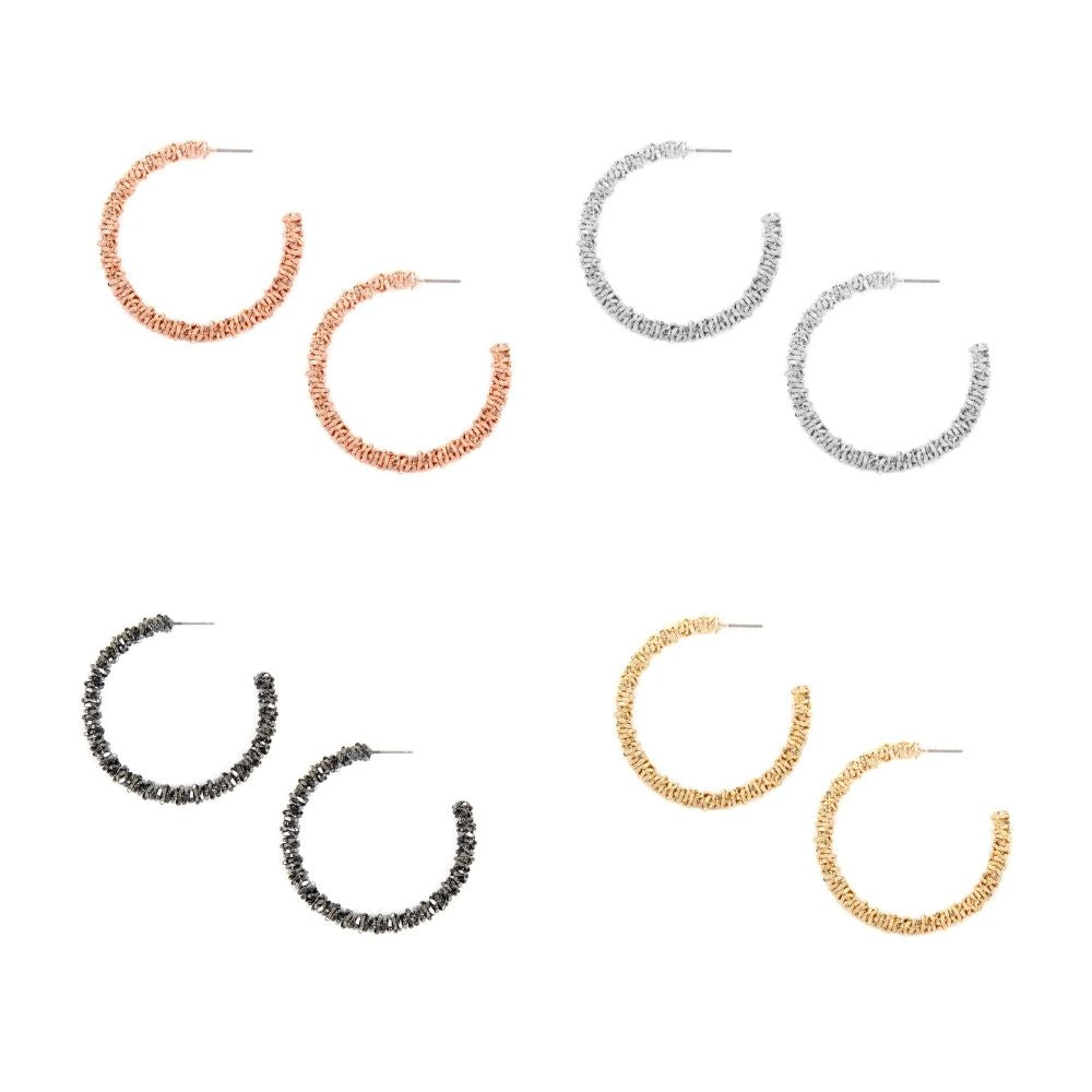 A pair of 3-inch brass beaded post hoop earrings in various colors, showcasing their elegant design and craftsmanship.