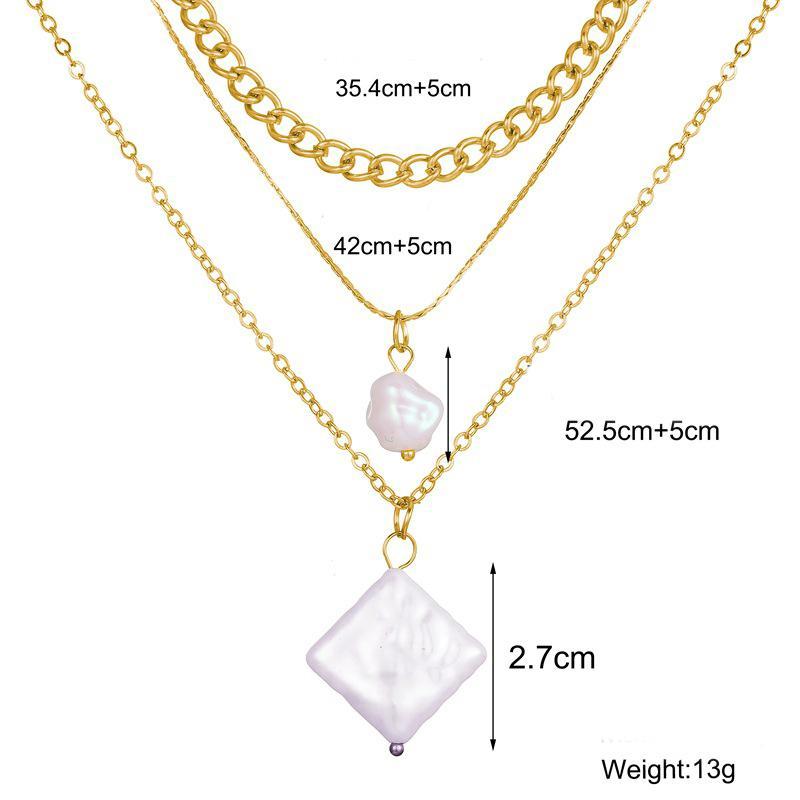 Elegant 3 Piece Pearl Linear Chain Necklace in 18K gold plating, featuring a unique linear design and a lobster clasp closure.