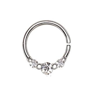 A sleek 316L stainless steel seamless ring featuring three cubic zirconia stones, perfect for various piercings.