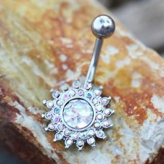 A dazzling 316L stainless steel navel ring featuring a sunburst design with multiple Aurora Borealis cubic zirconia stones, showcasing vibrant colors.