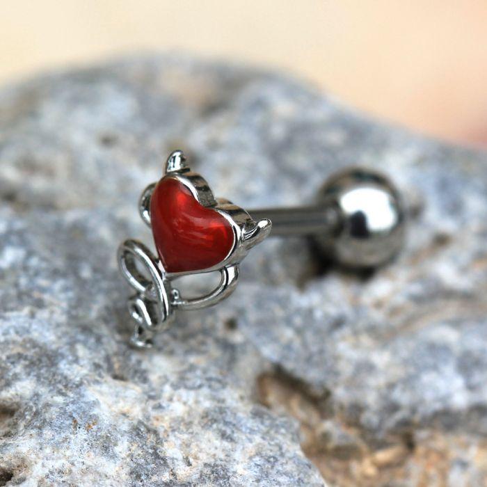 A 316L stainless steel cartilage earring featuring a devil's heart design with red enamel, horns, and tail, perfect for edgy styles.