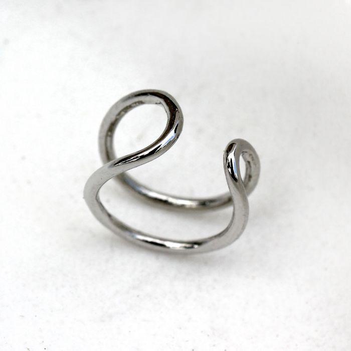 A stylish 316L stainless steel double ring fake cartilage ear cuff, showcasing its elegant design and polished finish.