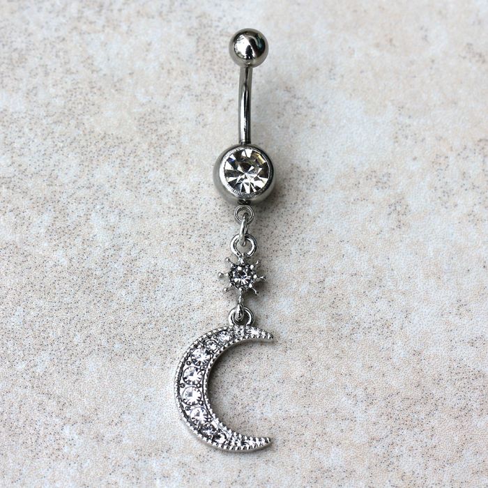A beautiful 316L stainless steel navel ring featuring a dangle design of a crescent moon and star, adorned with clear cubic zirconia stones.