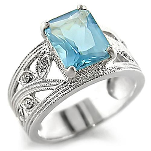 High-polished 925 sterling silver ring featuring a sea blue synthetic spinel centerpiece, elegantly designed for any occasion.