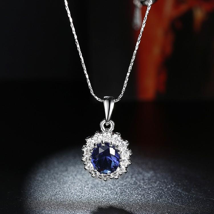Elegant 3.55 CTTW Sapphire Oval Cut Necklace set in 18K white gold plating, showcasing its stunning blue sapphire and intricate design.