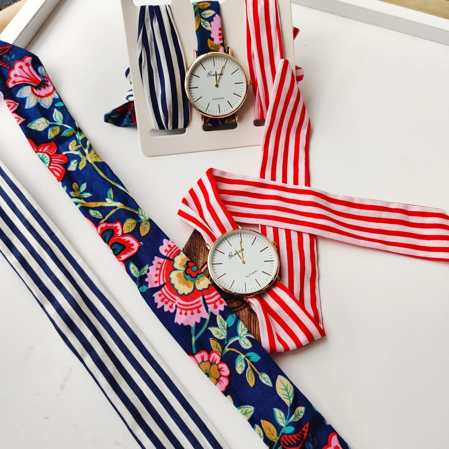 A stylish 3Pcs Stripe Handmade Cotton Strap women wristwatch set featuring three vibrant cotton straps and an elegant analogue dial.