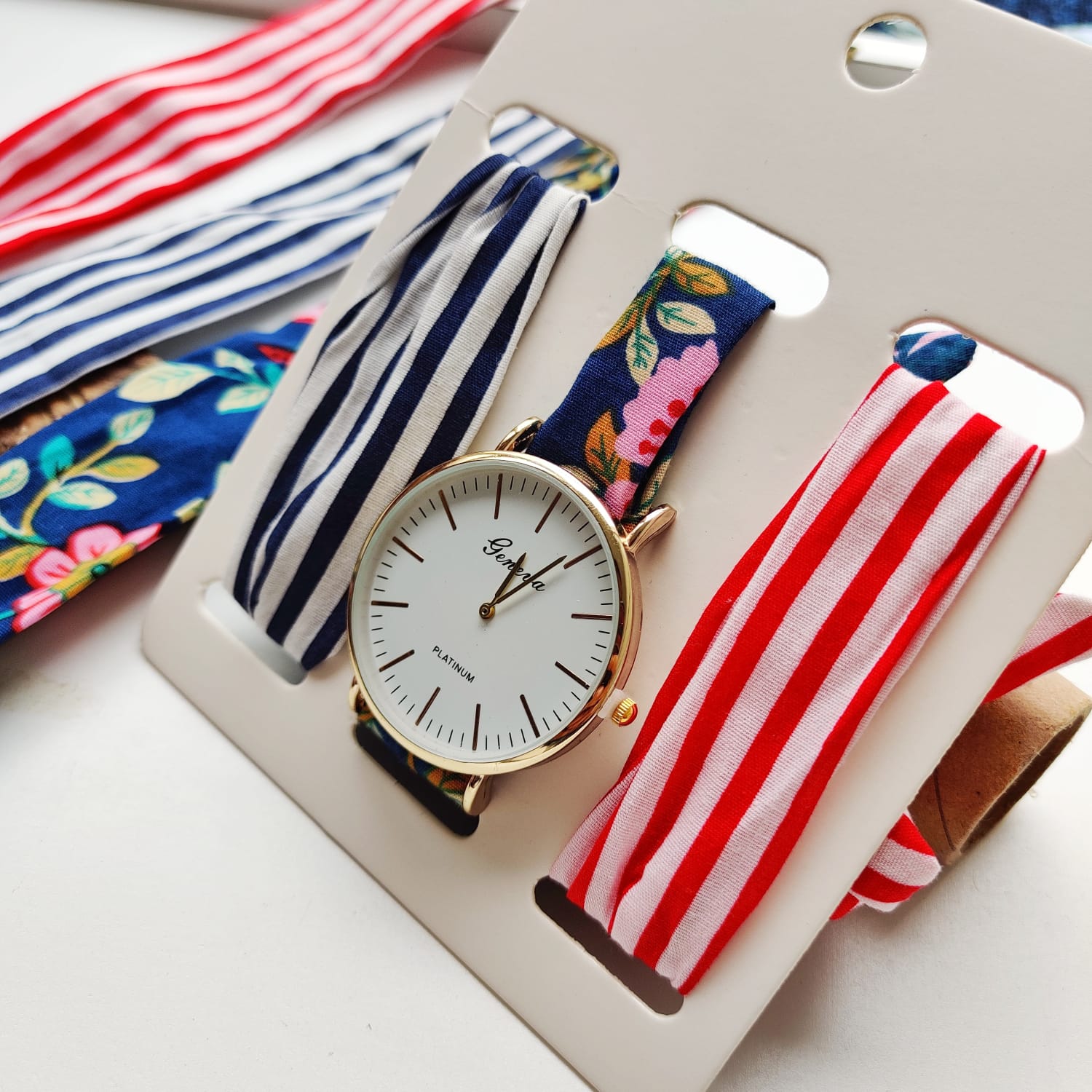 A stylish 3Pcs Stripe Handmade Cotton Strap women wristwatch set featuring three vibrant cotton straps and an elegant analogue dial.