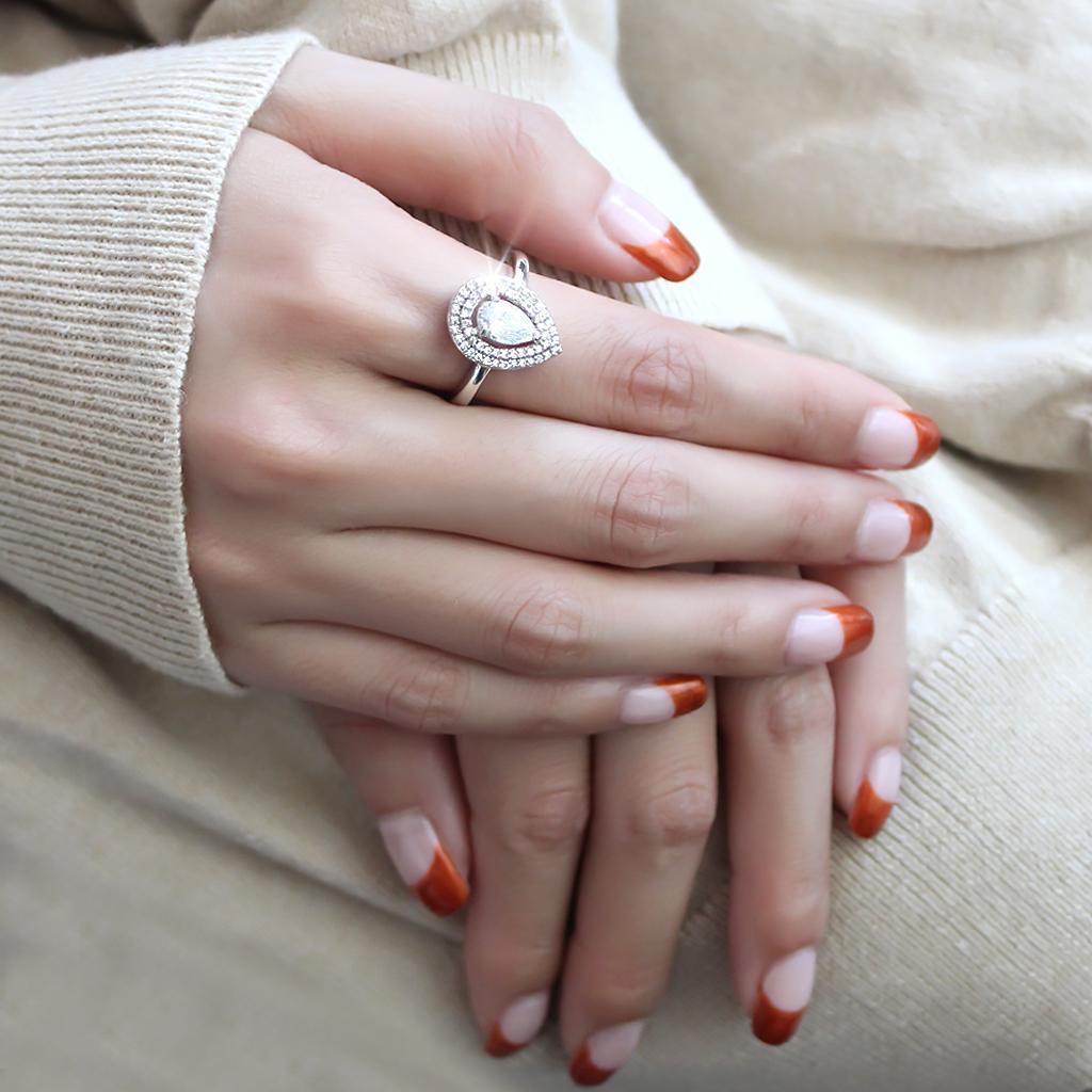 3W1453 Rhodium Brass Ring featuring a clear AAA Grade CZ stone, showcasing its elegant design and shiny finish.