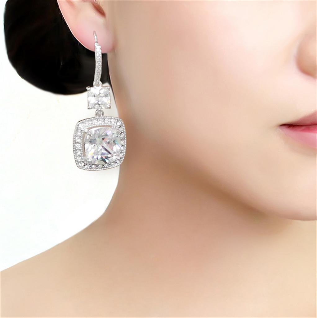 Elegant 3W1477 Rhodium Brass Earrings featuring a clear AAA Grade CZ stone, showcasing a luxurious design.
