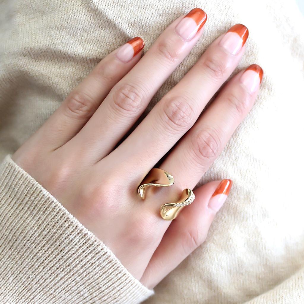 3W1475 Gold Brass Ring featuring a clear AAA Grade CZ stone, showcasing its elegant design and luxurious gold finish.