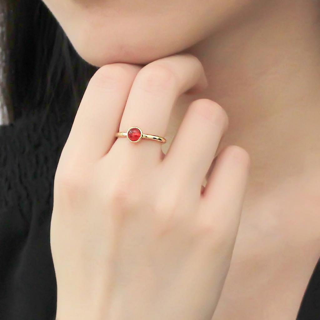 3W1496 Gold Brass Ring featuring a synthetic garnet glass stone, elegantly designed with a gold finish.
