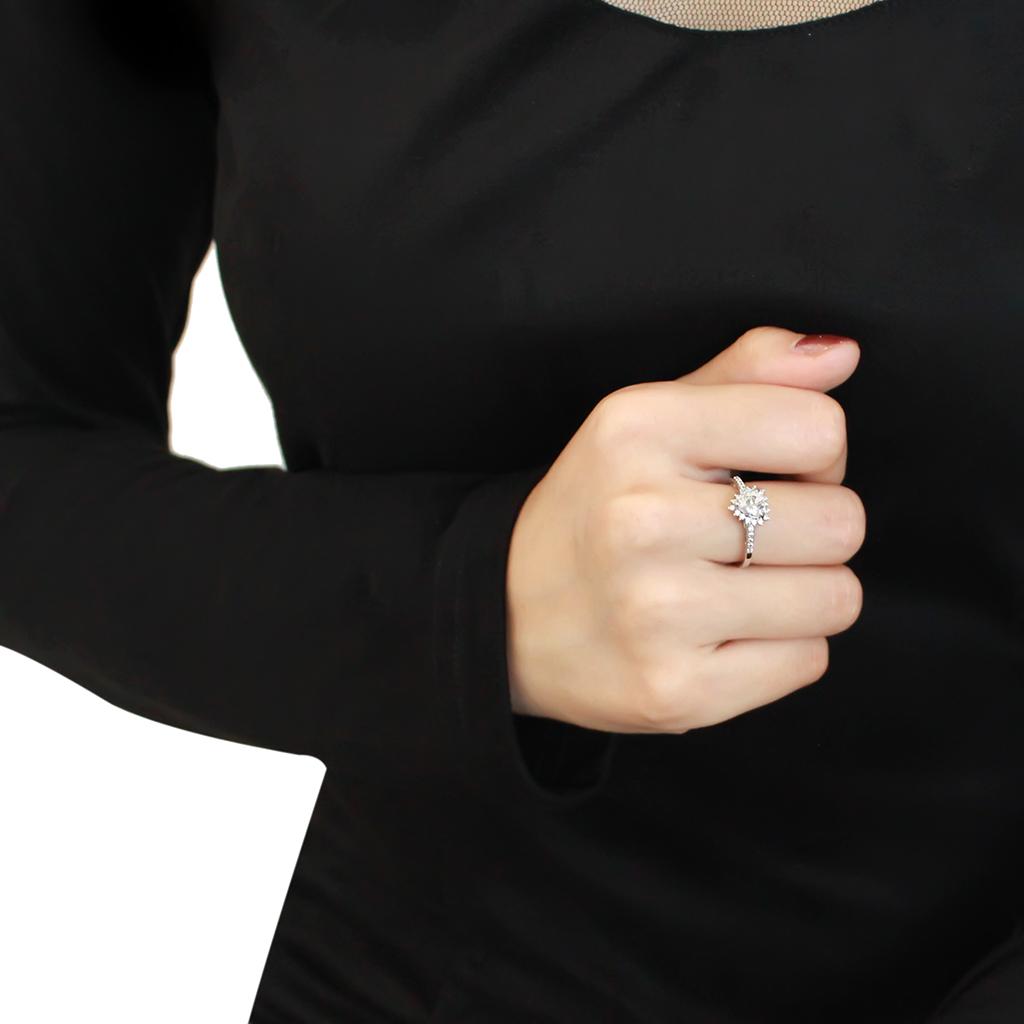 3W1526 Rhodium Brass Ring featuring a clear AAA Grade CZ stone, showcasing its elegant design and shiny finish.